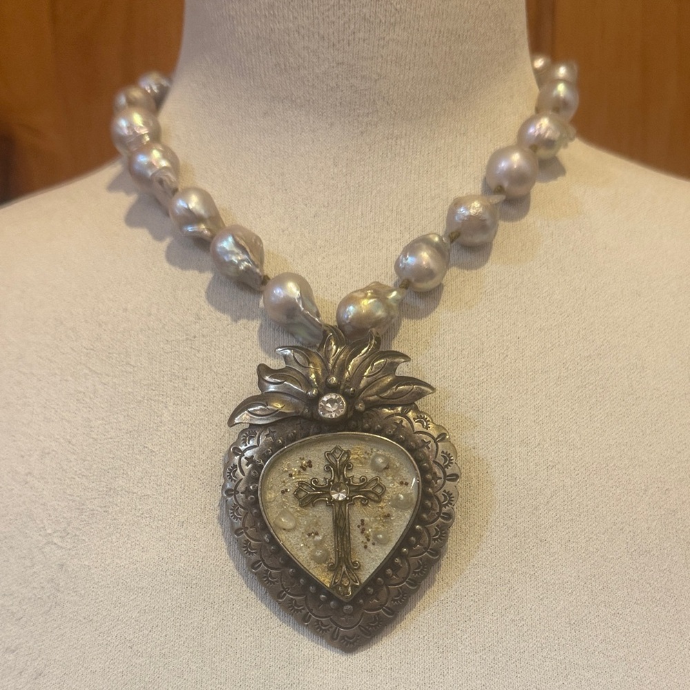 Necklace with cross.